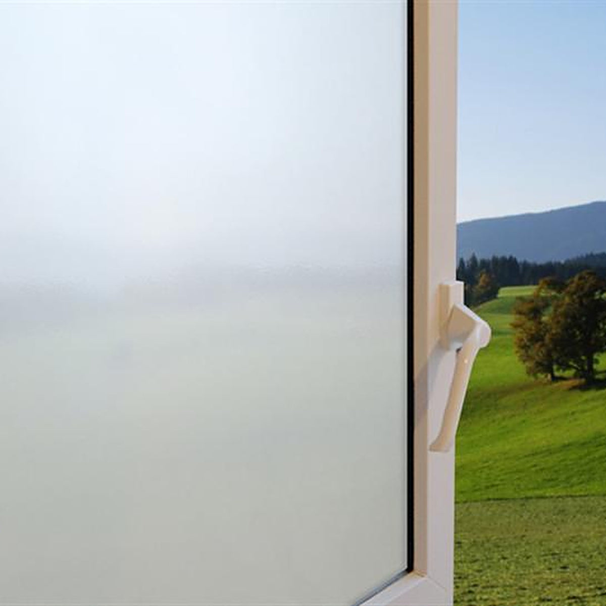 Clear Frost window film on a window, with clear glass beside it