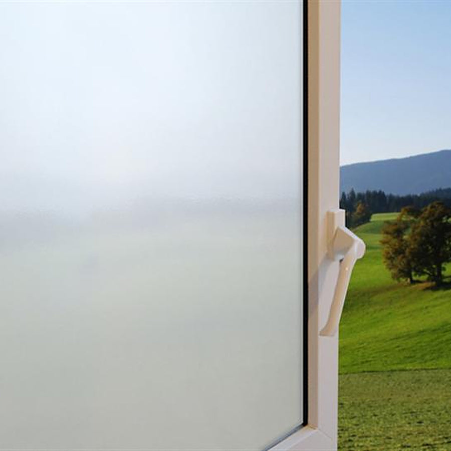 Clear Frost window film on a window, with clear glass beside it