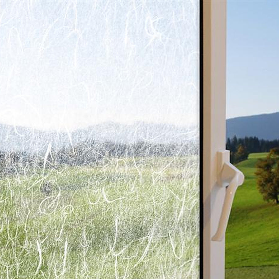 Clear Rice Paper window film on a window, with clear glass beside it