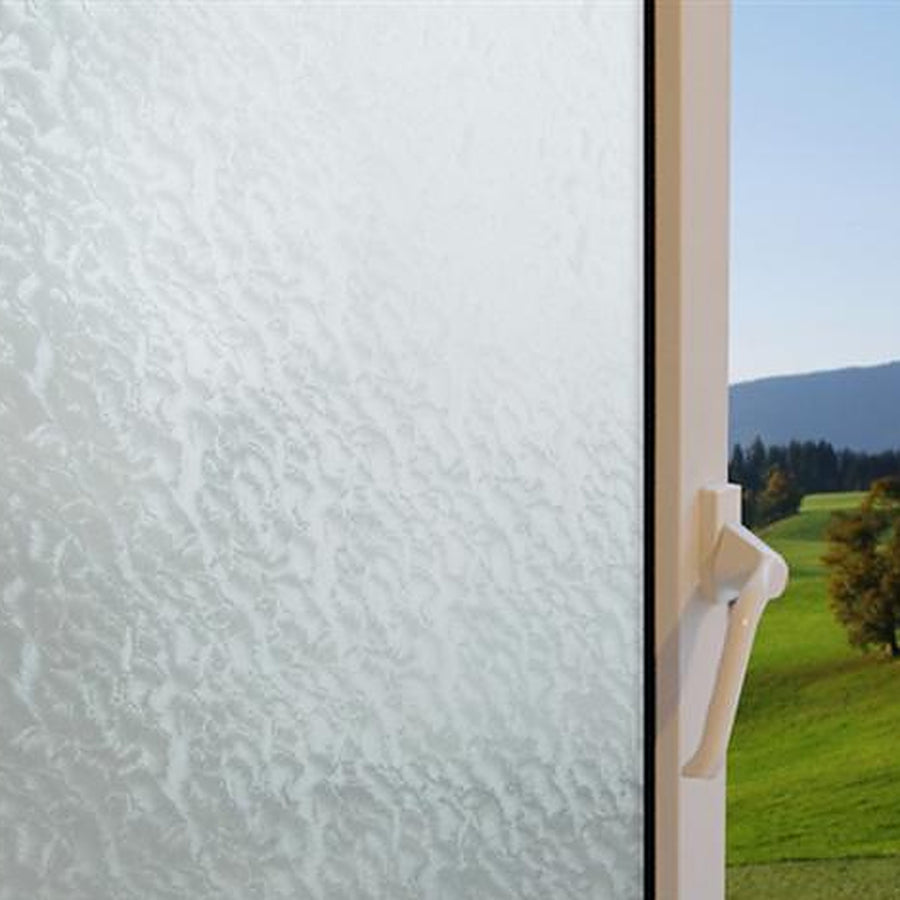 Clear Ripple Glass window film on a window, with clear glass beside it