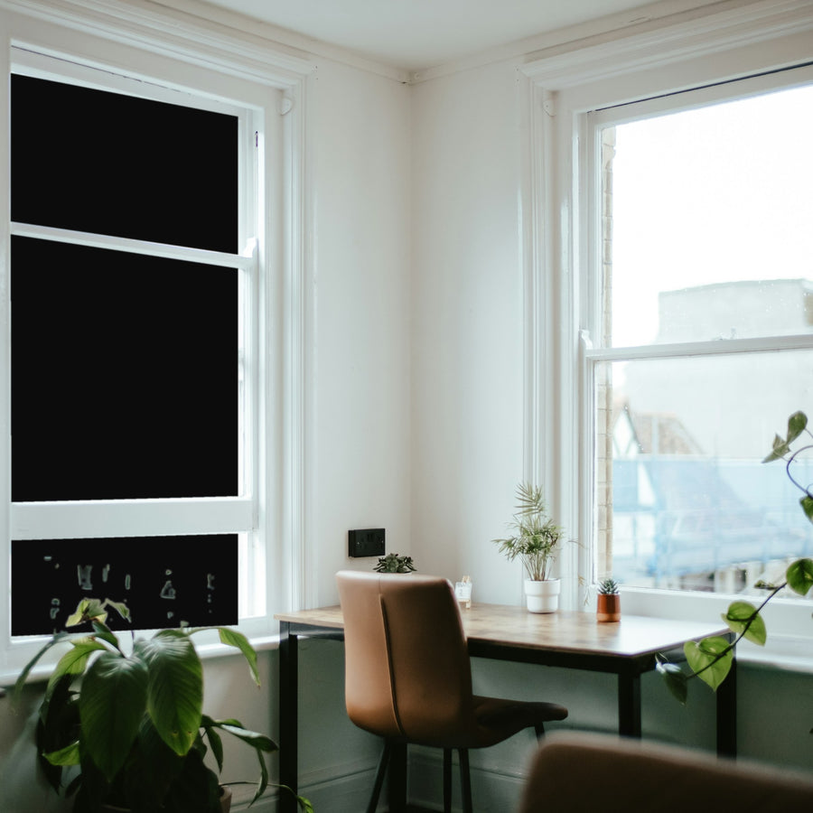 Simulated: SnapTint Blackout Opaque, 0% - BLACKOUT, on the left window next to clear glass
