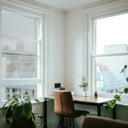Simulated: SnapTint Nano Ultra Vision, 50% - Light, on the left window next to clear glass