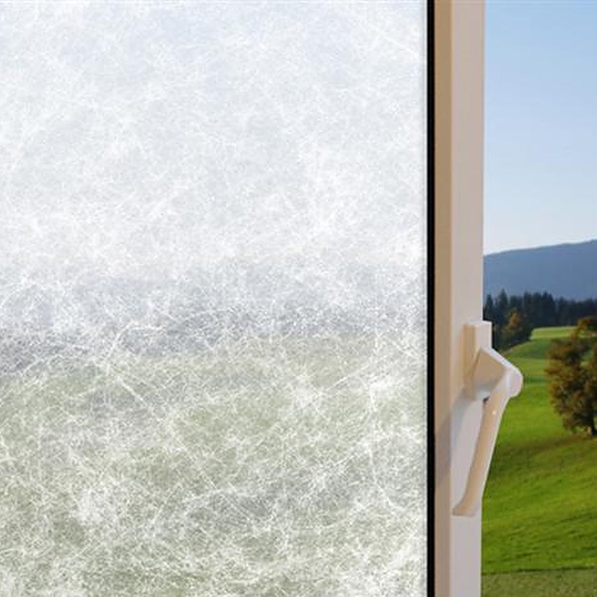 White Matte Fiber window film on a window, with clear glass beside it