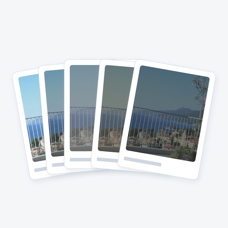 Window film sample cards from light to dark: clear, neutral, silver and bronze films